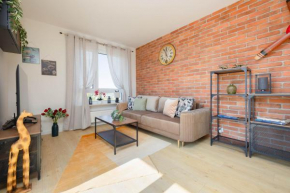 Exceptional Apartment in Warsaw with Parking by Noclegi Renters